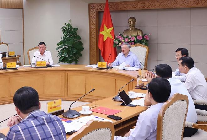 Phó Thủ tướng Thường trực Chính phủ Nguyễn Hòa Bình chủ trì cuộc họp. (Ảnh: Văn Điệp/TTXVN) pho-thu-tuong-nguyen-hoa-binh-3.jpg