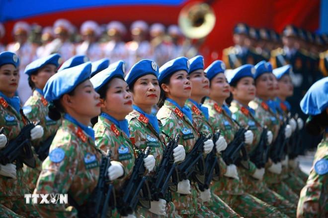 ttxvn-khoi-nu-gin-giu-hoa-binh-30.jpg