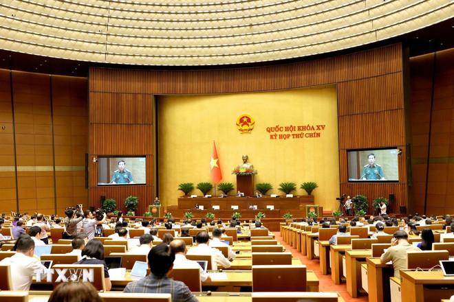 Toàn cảnh phiên họp. (Ảnh: Phương Hoa/TTXVN) ttxvn-ky-hop-thu-9-quoc-hoi-khoa-xv-thao-luan-o-hoi-truong-ve-du-an-luat-vn-tham-gia-gin-giu-hoa-binh-lhq3.jpg