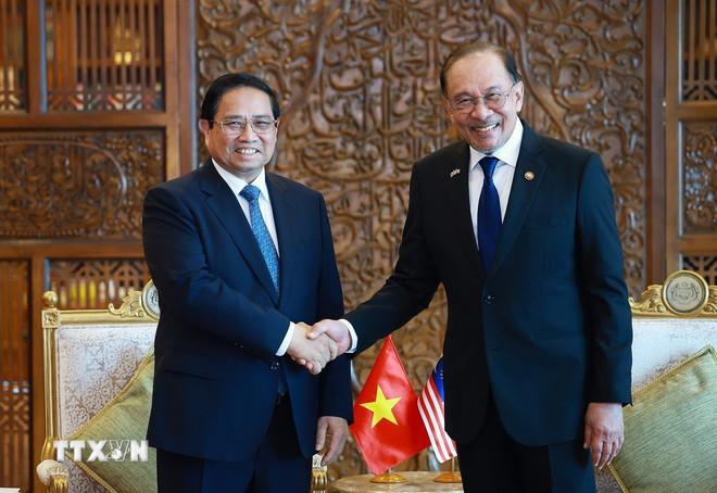 Thủ tướng Phạm Minh Chính hội đàm hẹp với Thủ tướng Malaysia Anwar Ibrahim. (Ảnh: Dương Giang/TTXVN) ttxvn-thu-tuong-pham-minh-chinh-hoi-dam-thu-tuong-malaysia-1.jpg