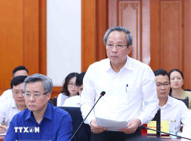 Đồng chí Hoàng Đăng Quang, Ủy viên Trung ương Đảng, Phó Trưởng Ban Thường trực Ban Tổ chức Trung ương trình bày báo cáo tại buổi làm việc. (Ảnh: Phương Hoa/TTXVN) ttxvn-tong-bi-thu-to-lam-lam-viec-voi-ban-to-chuc-trung-uong-2705-11.jpg