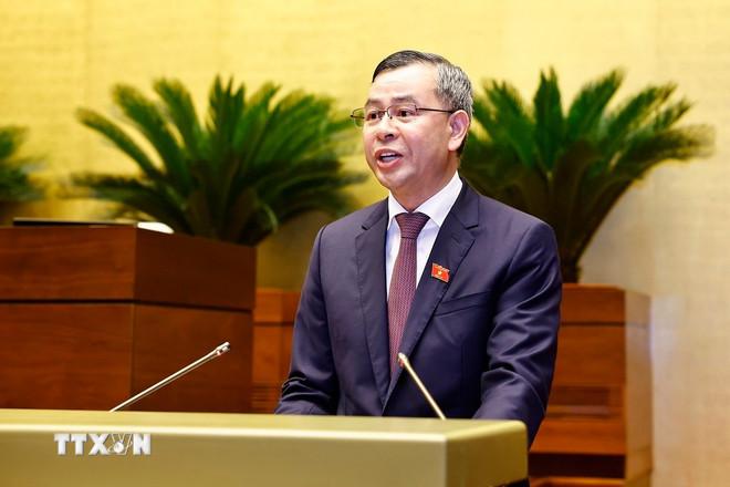 Tổng Kiểm toán nhà nước Ngô Văn Tuấn trình bày Báo cáo kiểm toán quyết toán ngân sách nhà nước năm 2023. (Ảnh: Doãn Tấn/TTXVN) ttxvn-2805-tong-kiem-toan-nha-nuoc-ngo-van-tuan.jpg