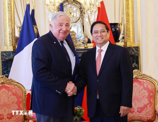 Thủ tướng Phạm Minh Chính hội kiến Chủ tịch Thượng viện Pháp Gerard Larcher. (Ảnh: Dương Giang/TTXVN) ttxvn-vna-potal-thu-tuong-hoi-kien-chu-tich-thuong-vien-phap-8084510.jpg