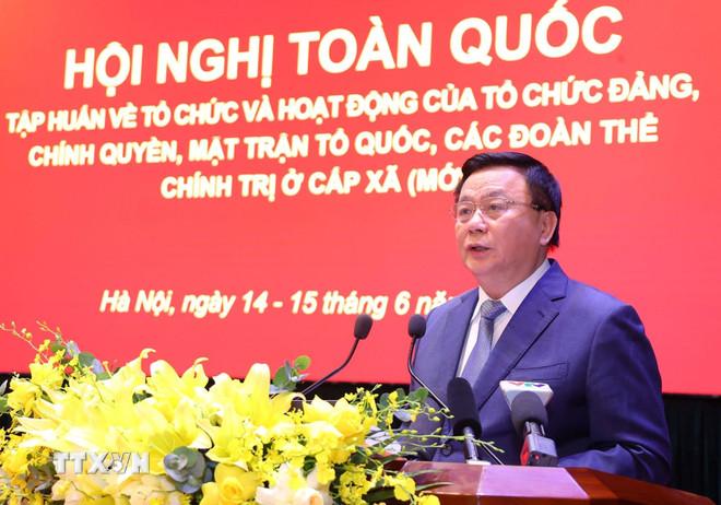 Giáo sư-Tiến sỹ Nguyễn Xuân Thắng, Ủy viên Bộ Chính trị, Giám đốc Học viện Chính trị Quốc gia Hồ Chí Minh, Chủ tịch Hội đồng Lý luận Trung ương phát biểu khai mạc. (Ảnh: Văn Điệp/TTXVN) ttxvn-tap-huan-hoat-dong-cua-mttq-va-doan-the-chinh-tri-cap-xa-moi-1406-3.jpg