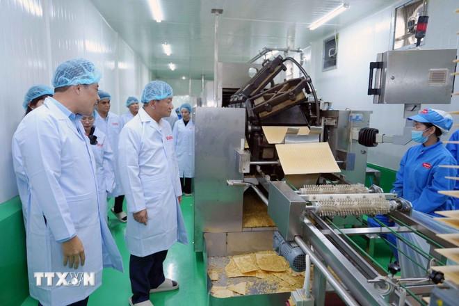 Cộng đồng doanh nghiệp kiều bào Việt Nam tại Lào góp phần duy trì sự gắn bó cộng đồng và vun đắp mối quan hệ đặc biệt giữa hai quốc gia. (Ảnh: Đỗ Bá Thành/TTXVN) ttxvn-lao24.jpg