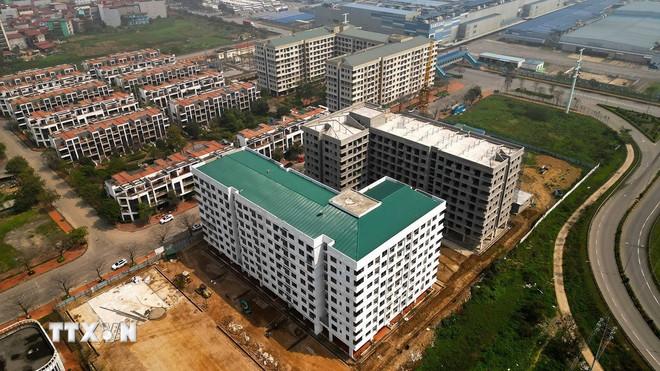 Nhu cầu vay vốn của các doanh nghiệp đầu tư xây dựng nhà ở xã hội cao. (Ảnh: Tuấn Anh/TTXVN) ttxvn-tin-dung-tphcm.jpg