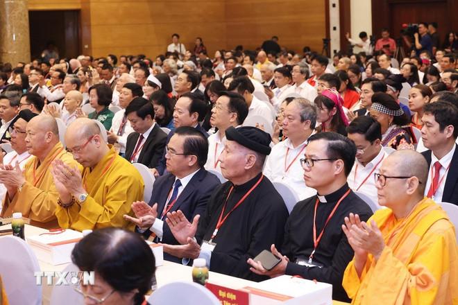 Đại biểu tiêu biểu, đại diện các tầng lớp nhân dân dự hội nghị. (Ảnh: Lâm Khánh/TTXVN) ttxvn-chu-tich-nuoc-va-thu-tuong-gap-mat-dai-bieu-tieu-bieu-12.jpg