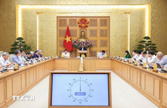 Thủ tướng Phạm Minh Chính làm việc với Hội đồng Tư vấn chính sách. (Ảnh: Dương Giang/TTXVN) ttxvn-thu-tuong-pham-minh-chinh-lam-viec-voi-hoi-dong-tu-van-chinh-sach-0709-2.jpg