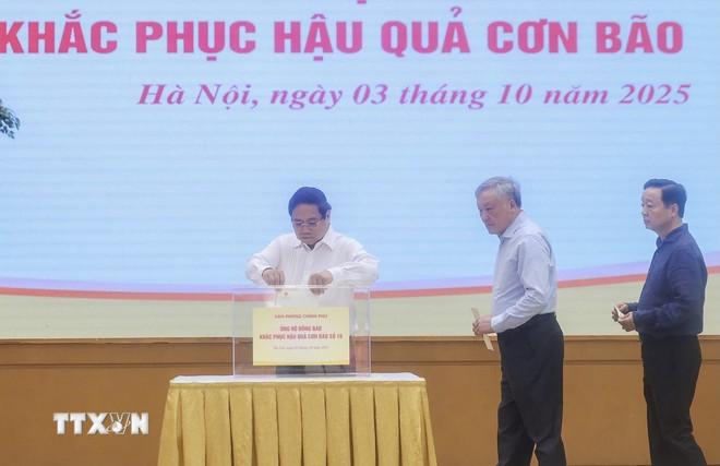 ttxvn-thu-tuong-ung-ho-bao-lu-2.jpg