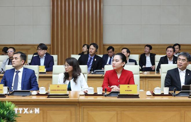 ttxvn-thu-tuong-tiep-doan-lanh-dao-doanh-nghiep-ban-dan-quoc-te-1-1703.jpg