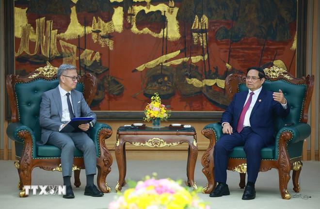 Thủ tướng Phạm Minh Chính tiếp Bộ trưởng Bộ Ngoại giao Lào Thongsavanh Phomvihane. (Ảnh: Dương Giang/TTXVN) ttxvn-thu-tuong-pham-minh-chinh-tiep-bo-truong-bo-ngoai-giao-lao-8480211-1.jpg