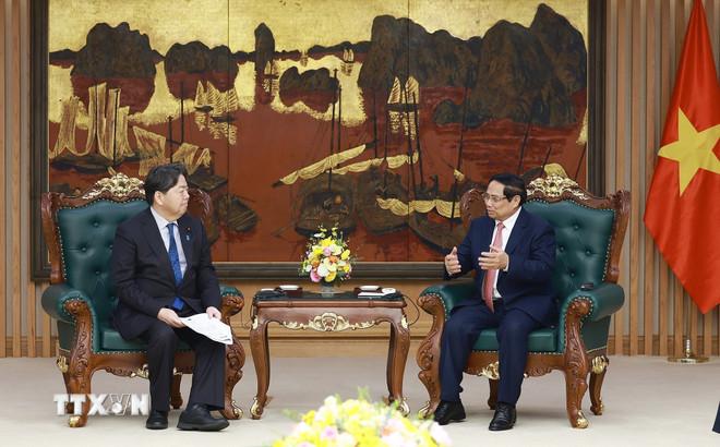 Thủ tướng Phạm Minh Chính và ông Hayashi Yoshimasa, Bộ trưởng Nội vụ và Truyền thông Nhật Bản. (Ảnh: Dương Giang/TTXVN) ttxvn-thu-tuong-pham-minh-chinh-tiep-bo-truong-noi-vu-va-truyen-thong-nhat-ban-3.jpg