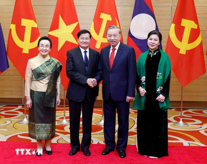 Tổng Bí thư Tô Lâm và Phu nhân với Tổng Bí thư, Chủ tịch nước Lào Thongloun Sisoulith và Phu nhân. (Ảnh: Thống Nhất/TTXVN) ttxvn-chieu-dai-trong-the-tong-bi-thu-chu-tich-nuoc-lao-thongloun-sisoulith-va-phu-nhan-8552855-8.jpg