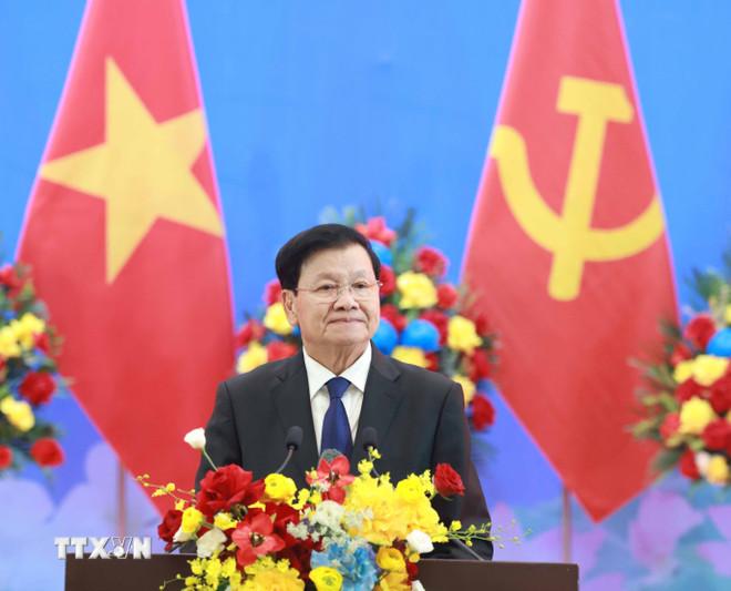 Tổng Bí thư, Chủ tịch nước Lào Thongloun Sisoulith phát biểu. (Ảnh: Thống Nhất/TTXVN) ttxvn-chieu-dai-trong-the-tong-bi-thu-chu-tich-nuoc-lao-thongloun-sisoulith-va-phu-nhan-8552855-4.jpg