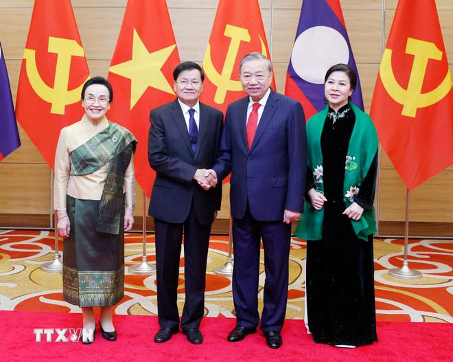 Tổng Bí thư Tô Lâm và Phu nhân với Tổng Bí thư, Chủ tịch nước Lào Thongloun Sisoulith và Phu nhân. (Ảnh: Thống Nhất/TTXVN) ttxvn-chieu-dai-trong-the-tong-bi-thu-chu-tich-nuoc-lao-thongloun-sisoulith-va-phu-nhan-8552855-9.jpg